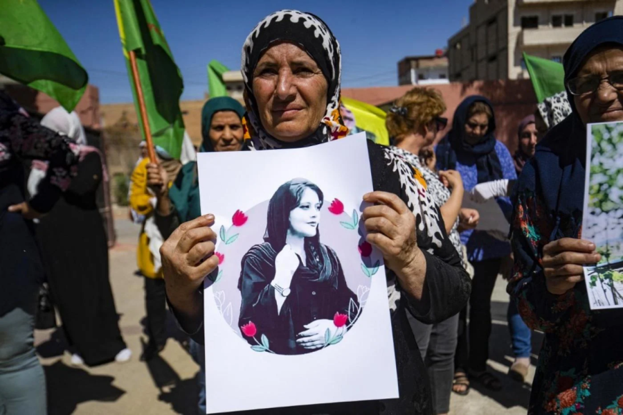Syrian Kurdish women in Hasakeh demonstrate in solidarity with Mahsa Amini.
Photo courtesy of AFP