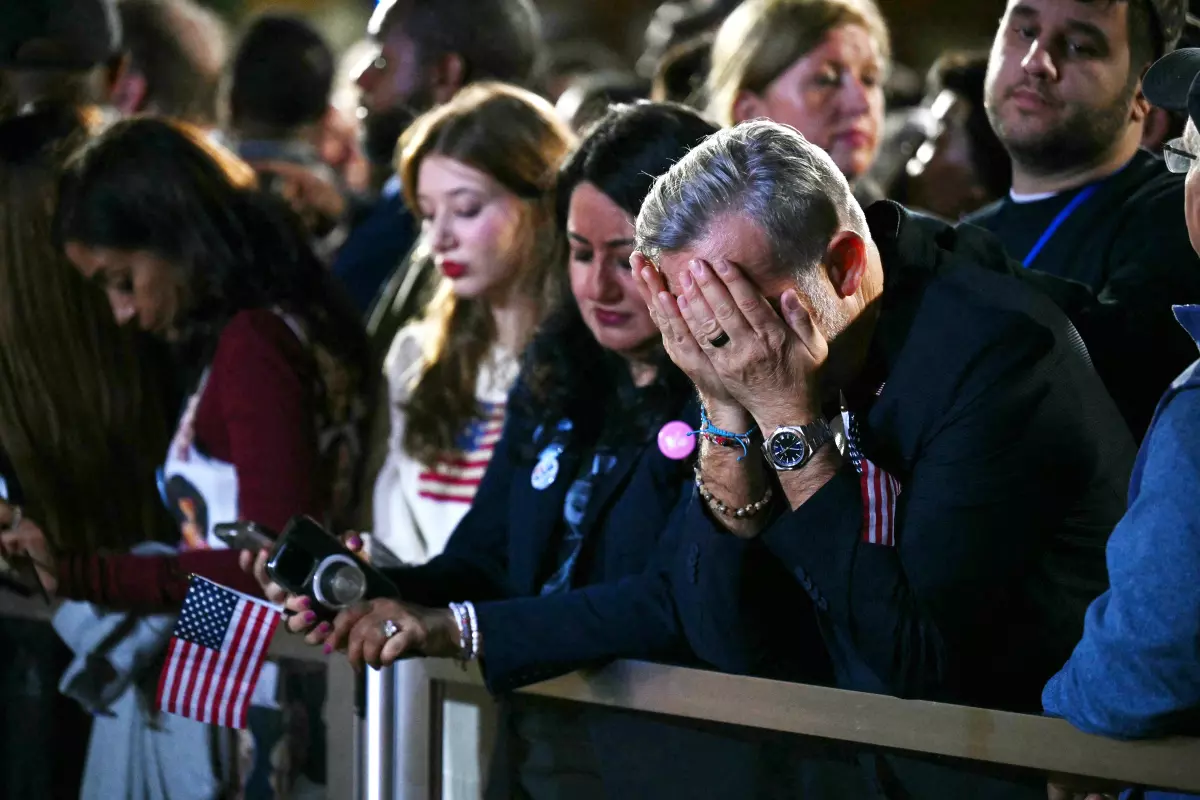 Democrats reacting as Harris concedes the election. Photo credit to Angela Weiss.